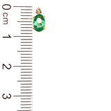 Aretes con esmeralda en oro amarillo 14k.