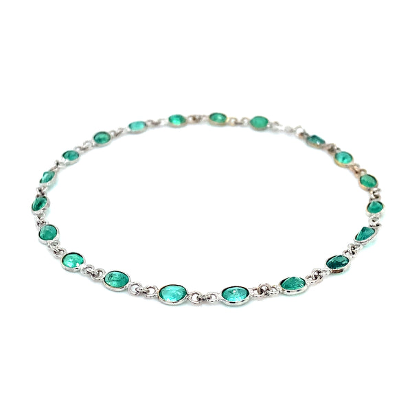 Pulsera con esmeralda en oro blanco 14kt.