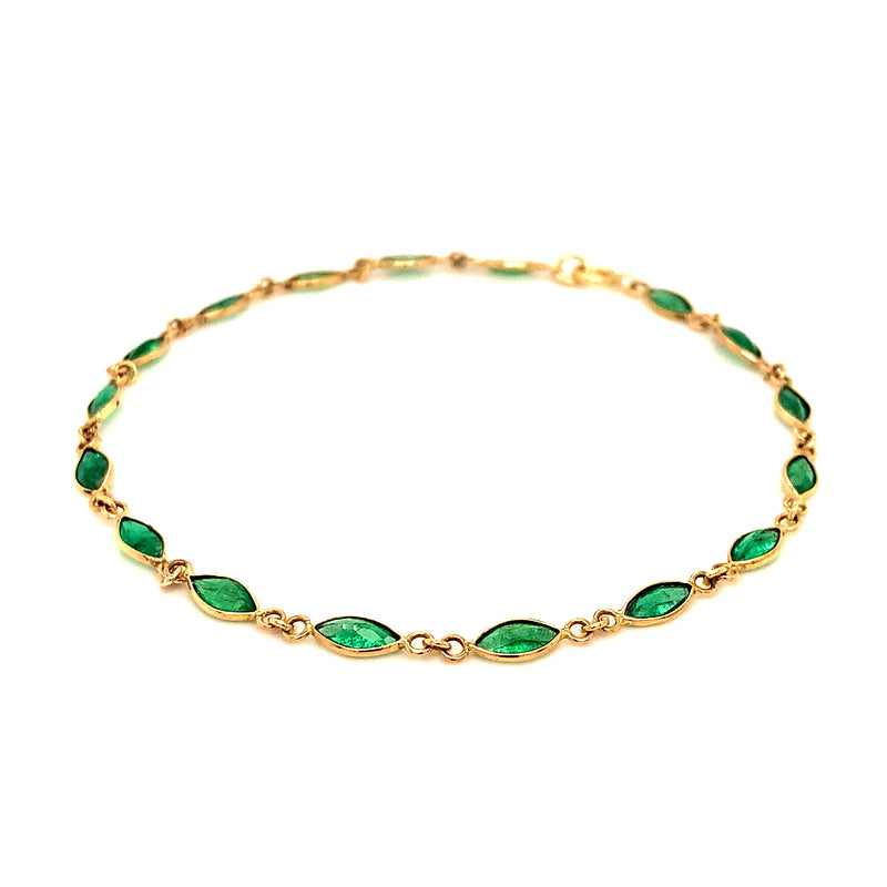 Pulsera con esmeralda en oro amarillo 14kt.