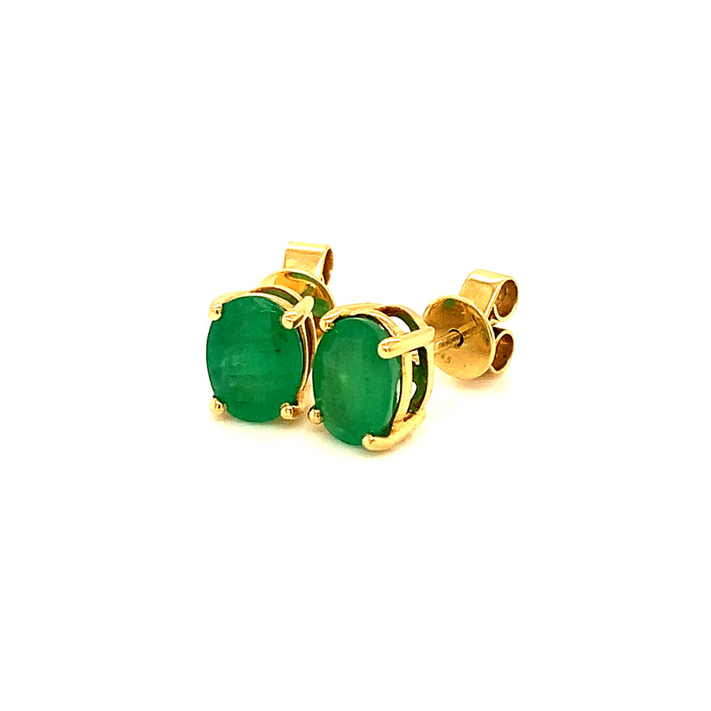 Aretes con esmeralda en oro amarillo 14k.
