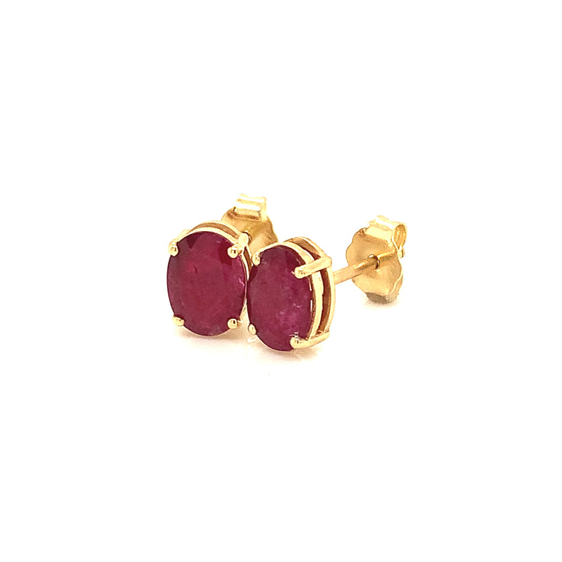 Aretes de rubí en oro amarillo 14kt