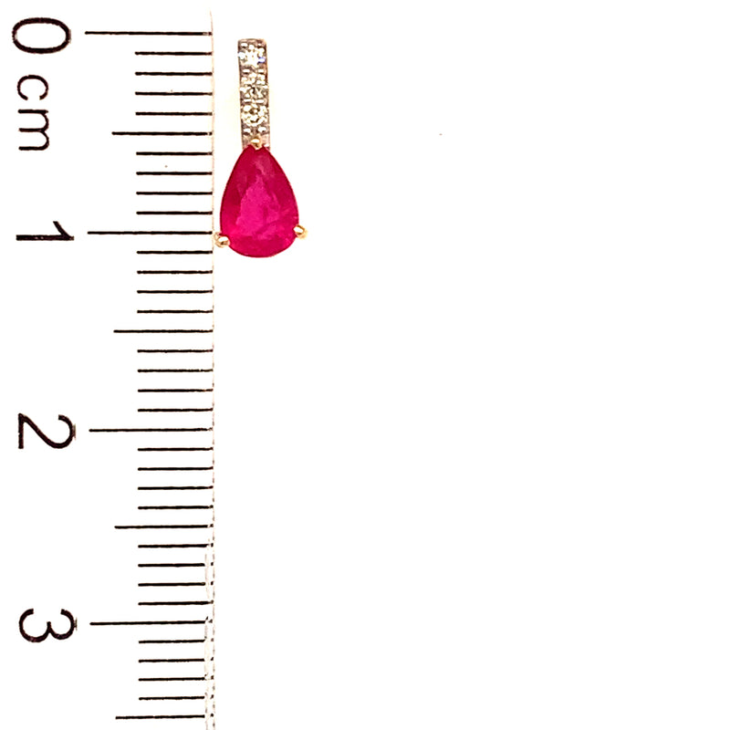 Aretes de rubí en oro amarillo 14kt