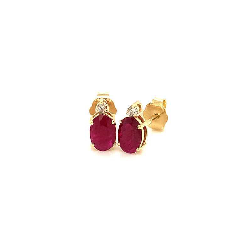 Aretes de rubí en oro amarillo 14kt