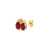 Aretes de rubí en oro amarillo 14kt