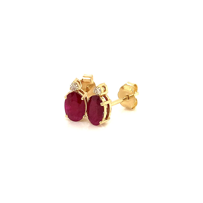 Aretes de rubí en oro amarillo 14kt