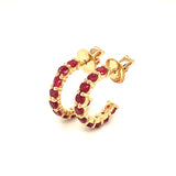 Aretes de rubí en oro amarillo 14kt