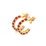 Aretes de rubí en oro amarillo 14kt
