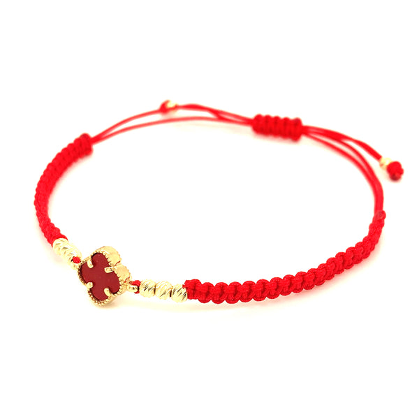 Pulsera (trébol rojo agata) en oro amarillo 10k e hilo rojo ajustable