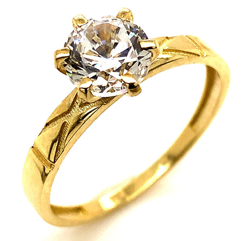 Anillo con circones en oro amarillo 10kt.