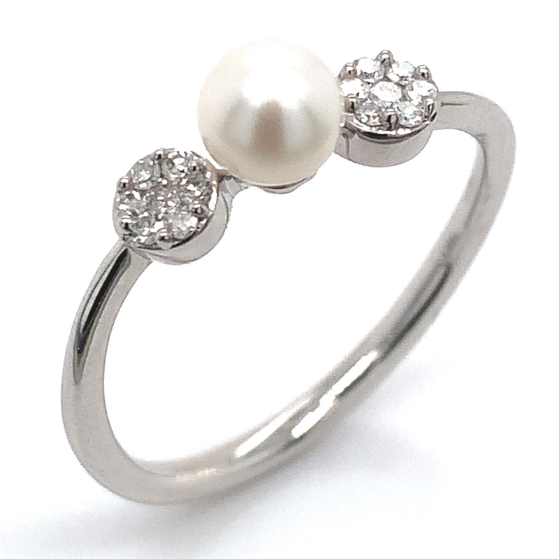 Anillo de perla con diamante en oro blanco 14kt.