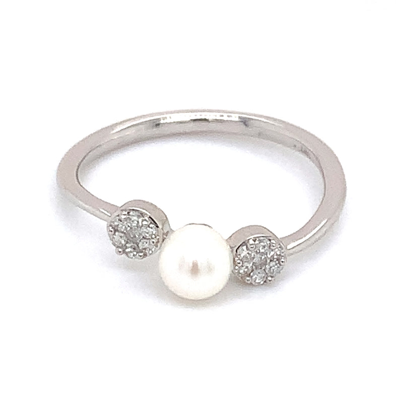 Anillo de perla con diamante en oro blanco 14kt.