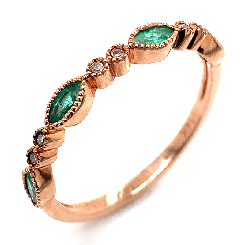 Anillo de esmeralda con diamantes en oro rosado 14kt.
