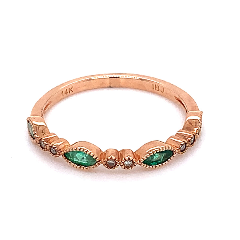 Anillo de esmeralda con diamantes en oro rosado 14kt.