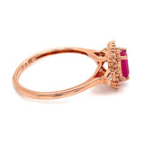 Anillo con rubí y diamantes en oro rosado 10KT