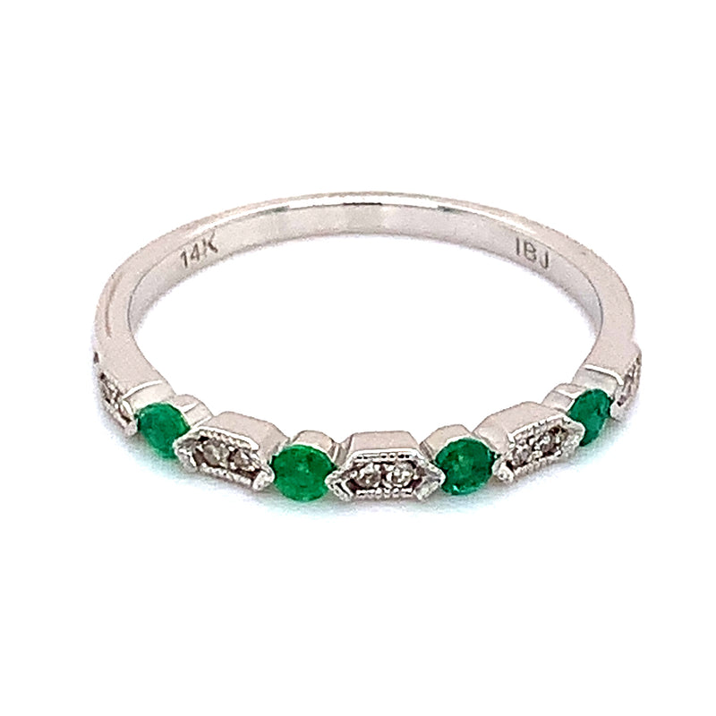 Anillo de esmeralda en oro blanco 14kt.