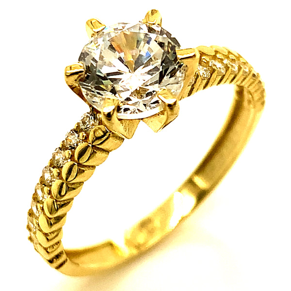 Anillo con circones en oro amarillo 10kt.