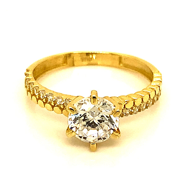 Anillo con circones en oro amarillo 10kt.