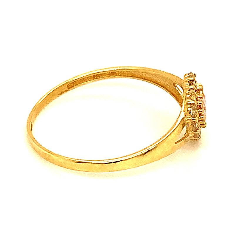 Anillo con circones en oro amarillo 10kt.