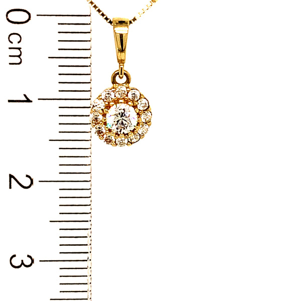 Juego de collar y aretes con circones en oro amarillo 10k.
