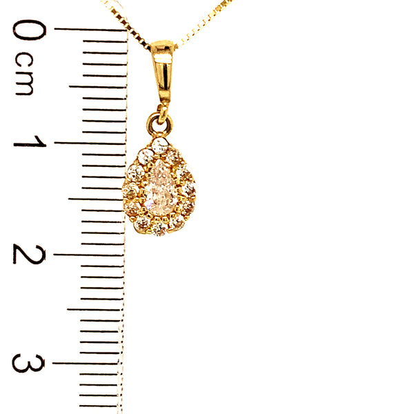 Juego de collar y aretes con circones en oro amarillo 10k.