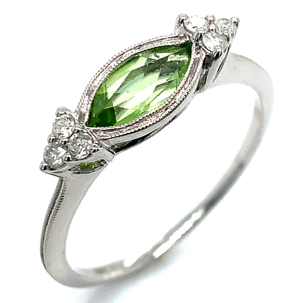 Anillo de Peridoto en oro blanco 10kt.  ANTES:  $369.00