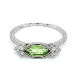 Anillo de Peridoto en oro blanco 10kt.