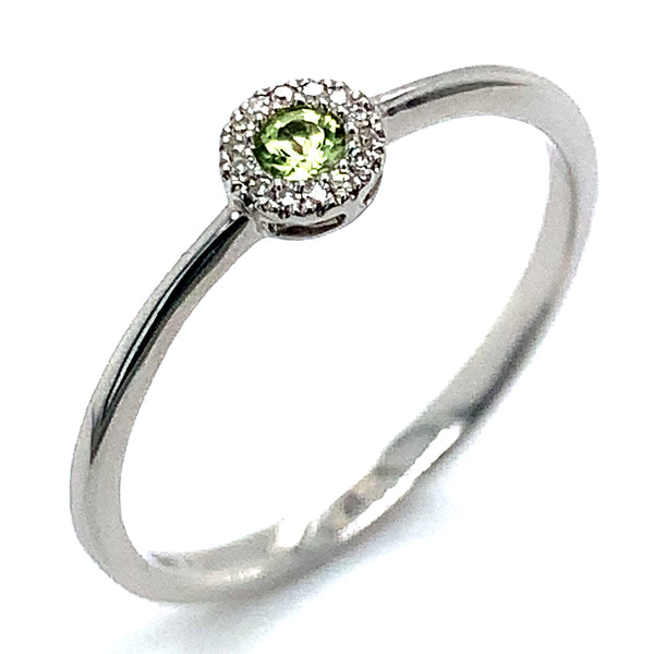 Anillo de Peridoto en oro blanco 10kt.  ANTES:  $249.00