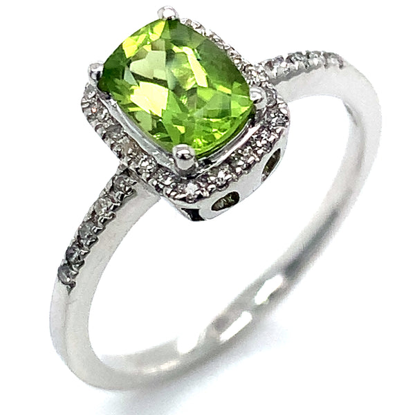 Anillo de Peridoto en oro blanco 10kt.  ANTES:  $499.00