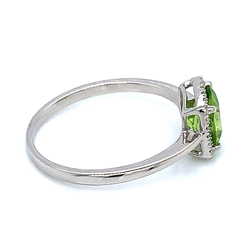 Anillo de Peridoto en oro blanco 10kt.