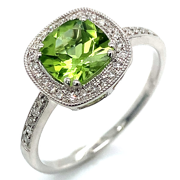 Anillo de Peridoto en oro blanco 10kt.  ANTES:  $499.00