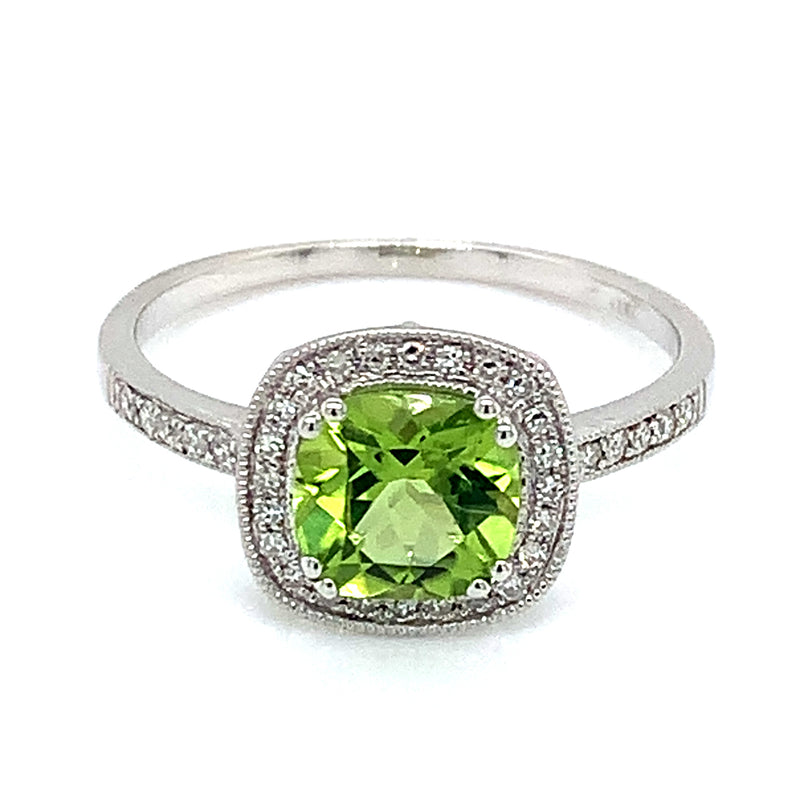Anillo de Peridoto en oro blanco 10kt.