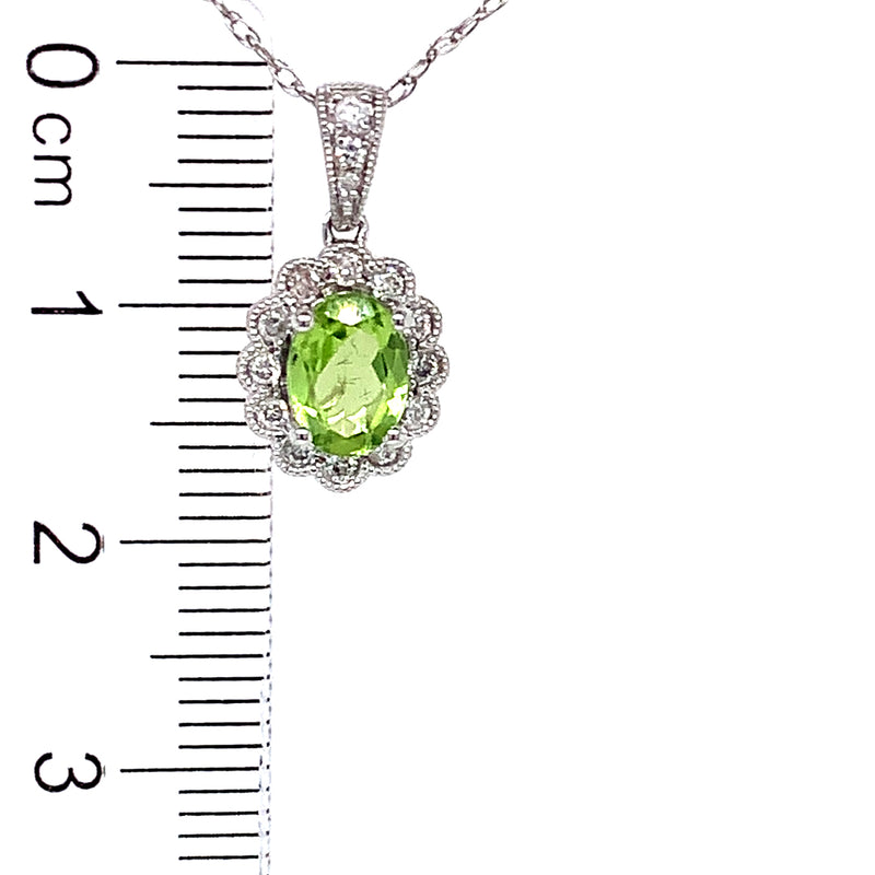 Collar de Peridoto en oro blanco 10kt.  ANTES:  $399.00