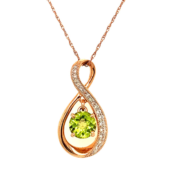 Collar de Peridoto con Zafiros blancos en oro rosado 14kt.  ANTES:  $399.00