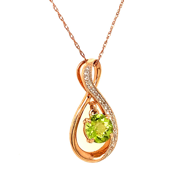 Collar de Peridoto con Zafiros blancos en oro rosado 14kt.  ANTES:  $399.00