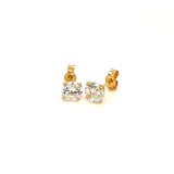 Aretes con circones en oro amarillo 18kt