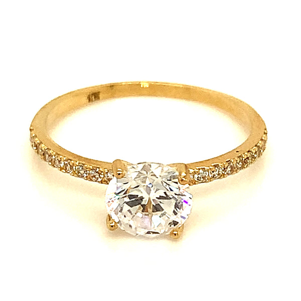 Anillo con circones en oro amarillo 10kt.