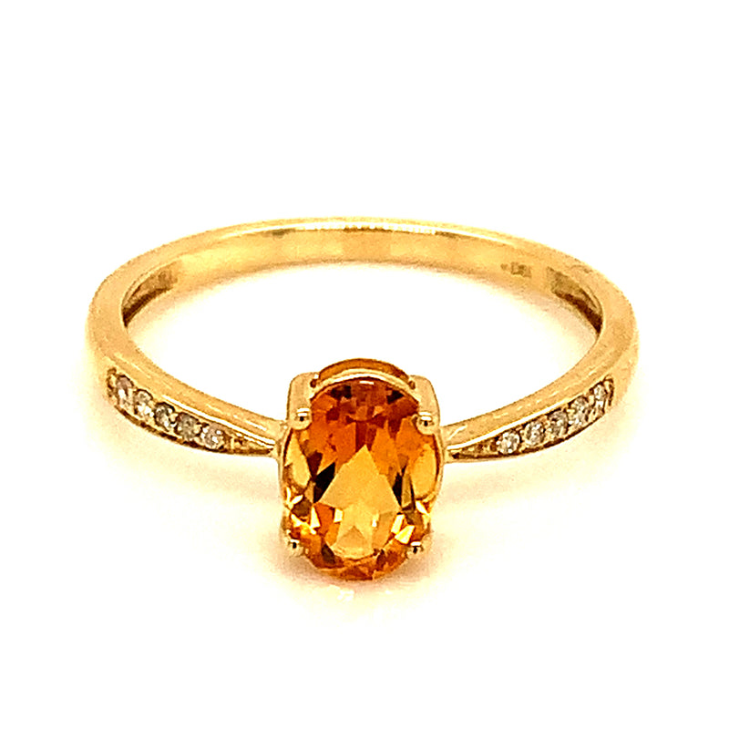 Anillo de citrino con diamante en oro amarillo 10kt.