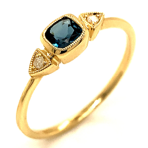 Anillo de Topacio Azul en oro amarillo 10kt. ANTES: $249.00