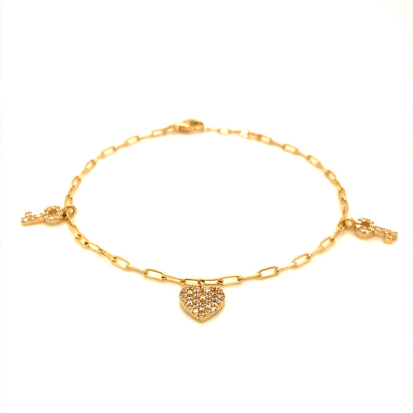 Pulsera (llave, corazón con circones) en oro amarillo 10kt. 16/17.5cm