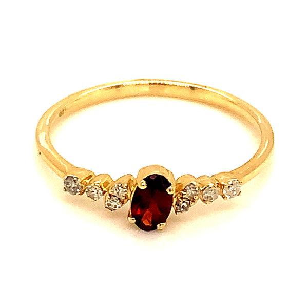 Anillo de granate en oro amarillo 10kt. ANTES: $329.00