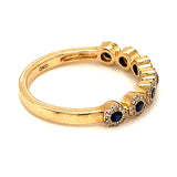 Anillo de zafiro con diamantes en oro amarillo 10kt.