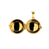 Dije (relicario) en oro amarillo 18k