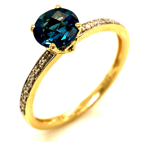 Anillo de Topacio Azul en oro amarillo 10kt. ANTES: $349.00