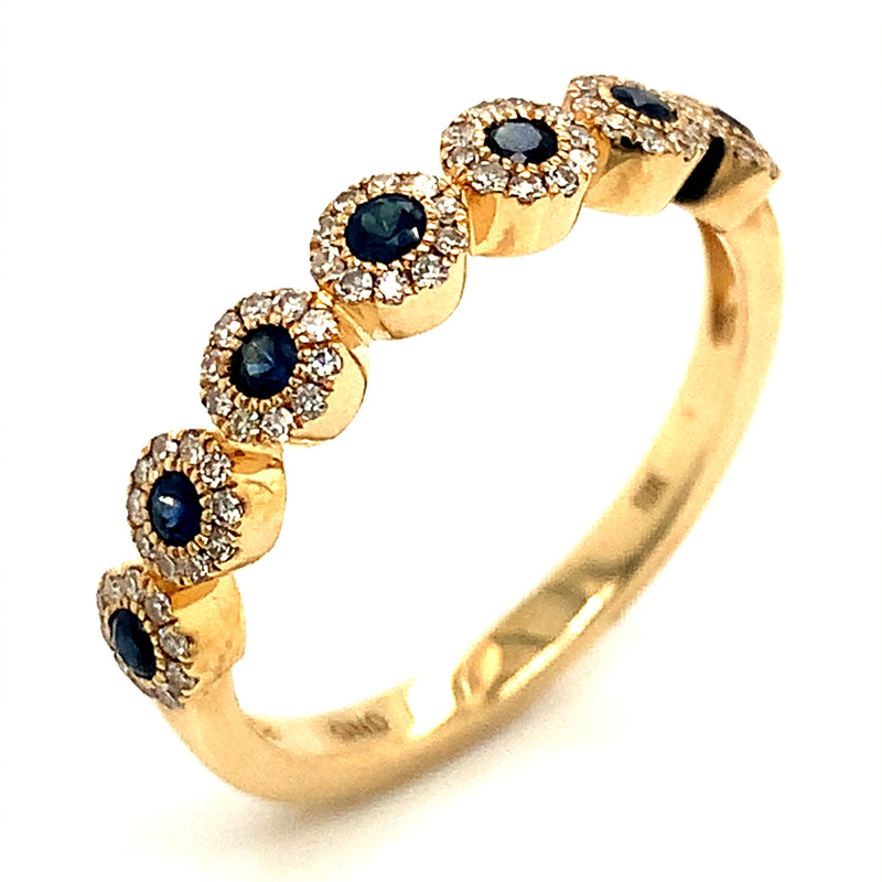 Anillo de zafiro con diamantes en oro amarillo 10kt.