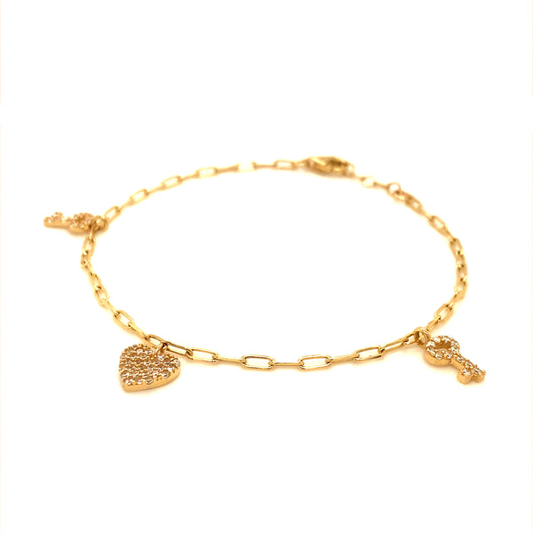 Pulsera (llave, corazón con circones) en oro amarillo 10kt. 16/17.5cm