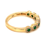 Anillo de esmeralda con diamantes en oro amarillo 10kt.