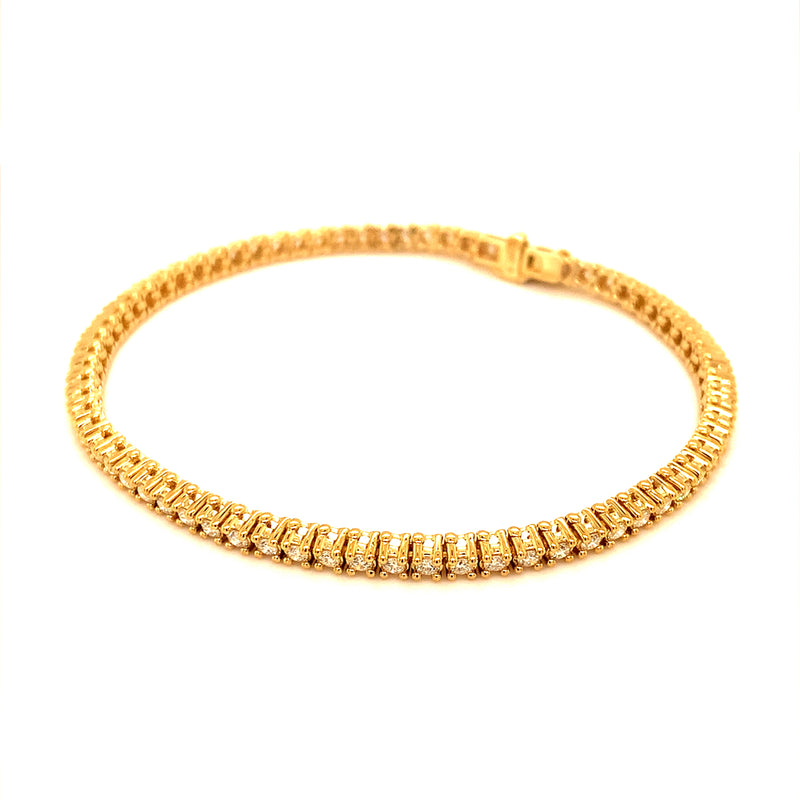 (LD) Pulsera (tennis) con diamantes de laboratorio en oro amarillo 14kt.