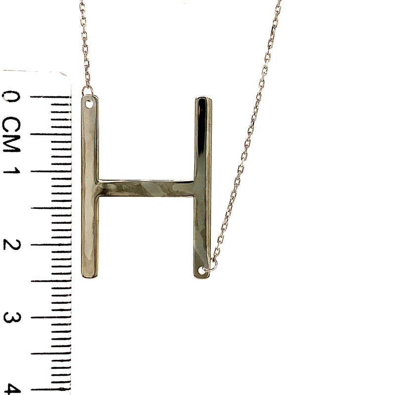 Collar con inicial (H) en oro blanco 10kt. 42-45cm