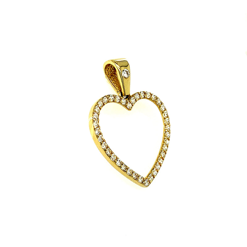 Dije (corazón) con circones en oro amarillo 10kt.