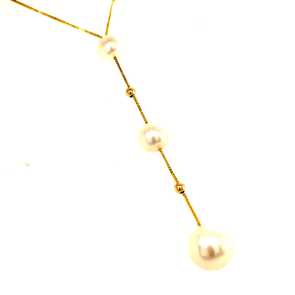 Collar de perlas blancas en oro amarillo 14kt. 45cm  ANTES:  $450.00